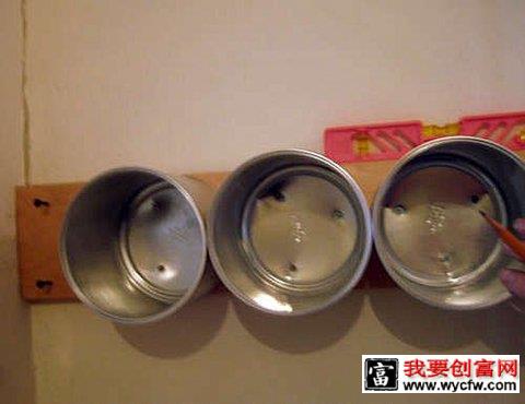 用奶粉罐制作的墙壁收纳挂到墙壁上2